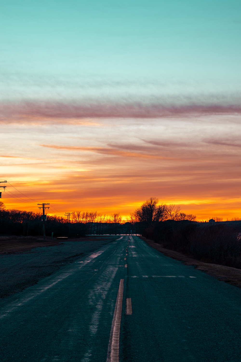 Sunset over road